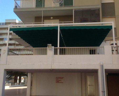 Toldos corredizos  modelo Zen ( estructura ovalada y seccion de 90/50) instalados en club social del residencial Aguamarina C 