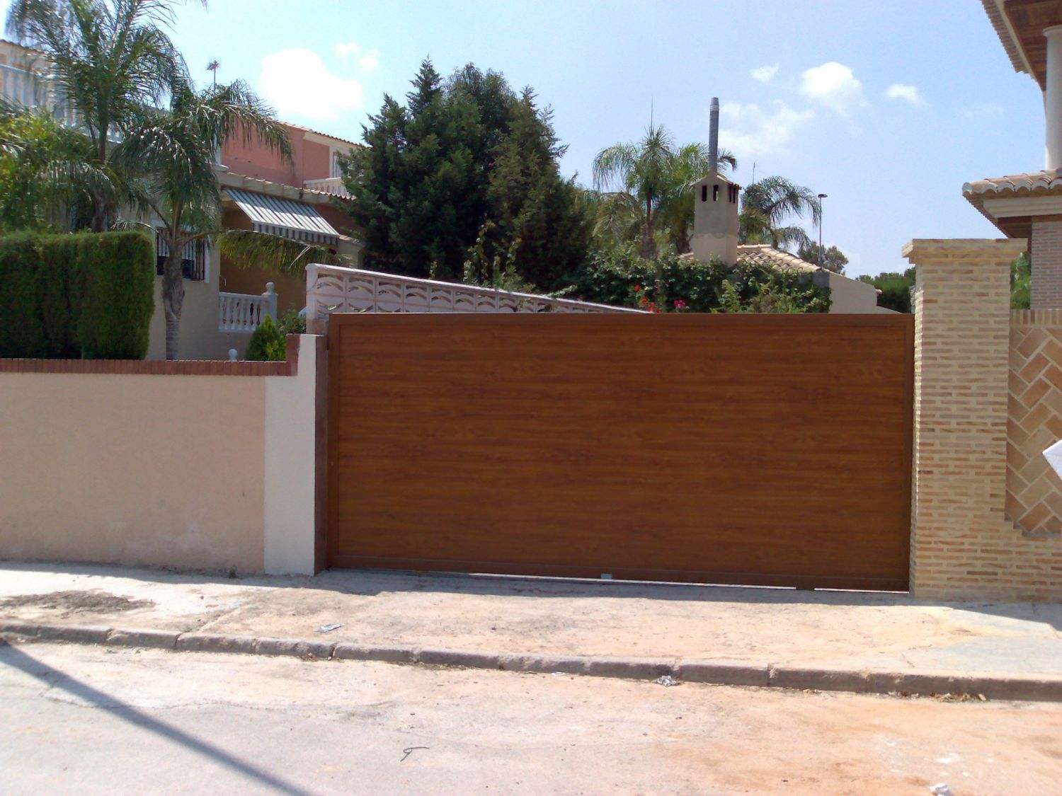 Puertas correderas de panel :: PORTALOY- Fabricación y mantenimiento de