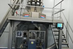 Pesadora multicabezal Weigma y envasadora Vertical ENVASEF EC-600. linea de envasado