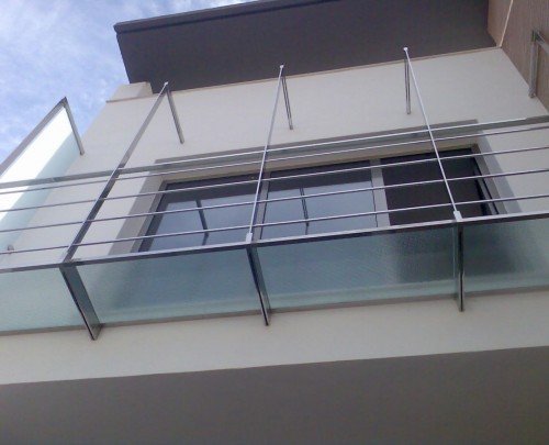 Balcón acero inoxidable con cristal 