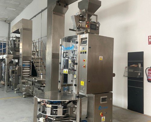 Envasadora automática con pesadora lineal u carrusel de paquete cuadrado.