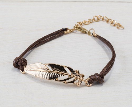 pulsera pluma dorada de metal