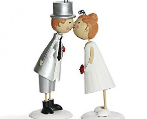 novios de metal beso